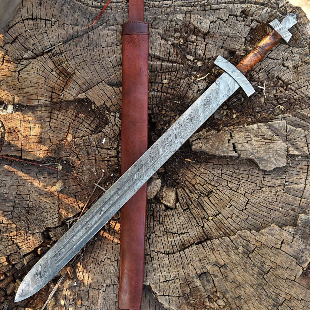 Damascus sword and collectible blade detail from Deer Edge