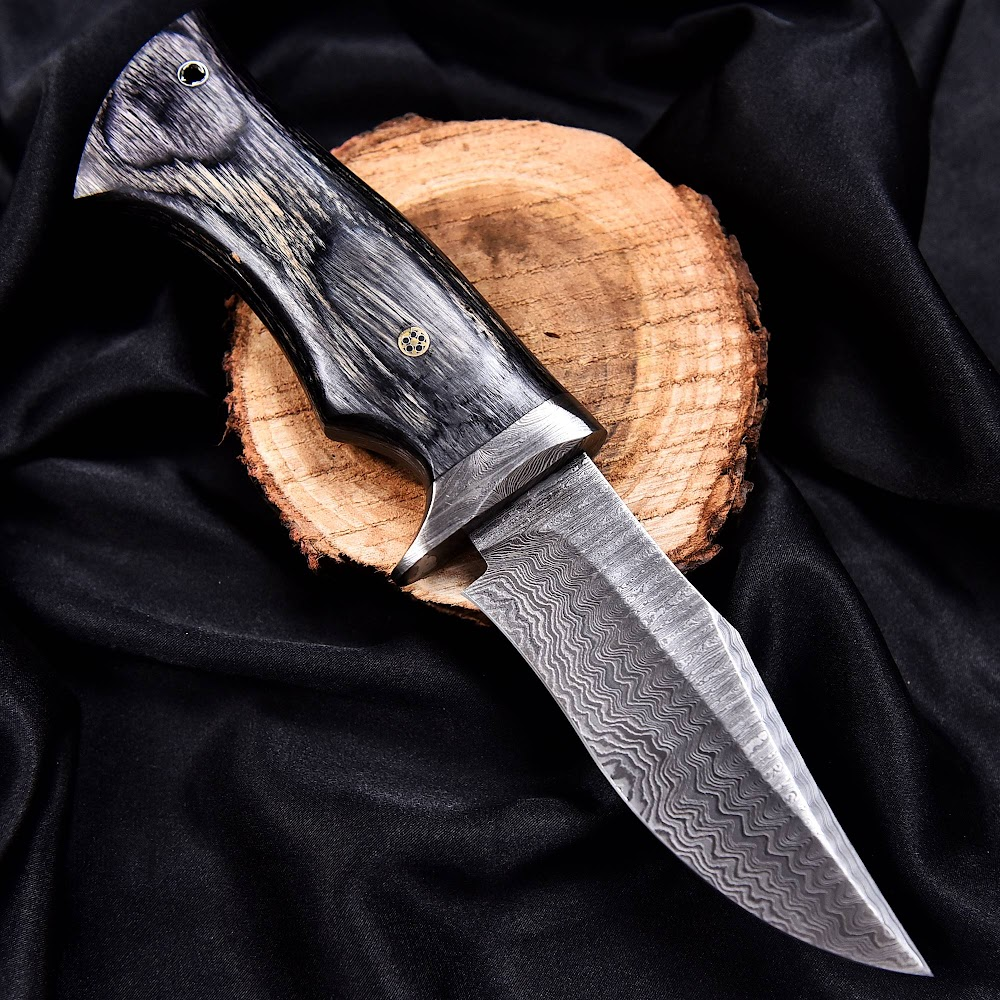 Deer Edge handcrafted hunting knife with leather sheath